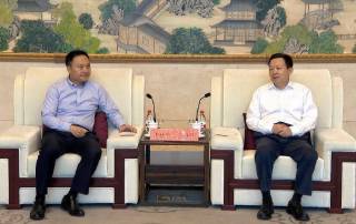 集团公司总经理余红辉一行拜访苏州市委书记周乃翔